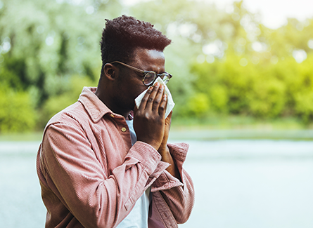 Sneezing man