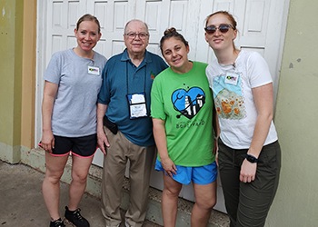 Three nurses with Bob, the organizer