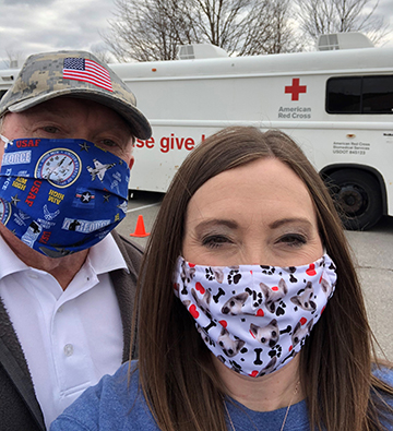 Katherine with her Dad donating blood