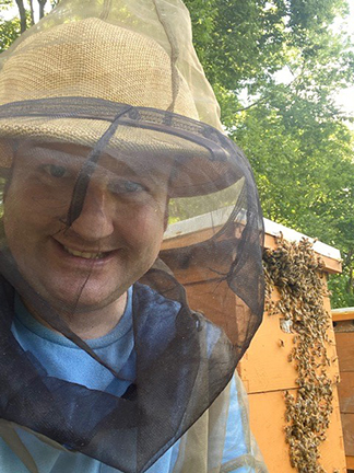 Dr. Brown in beekeeping outfit