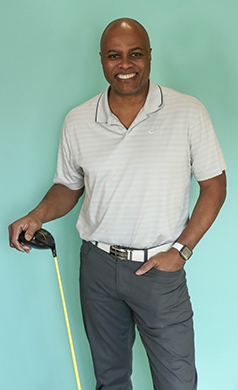 Ray with golf club