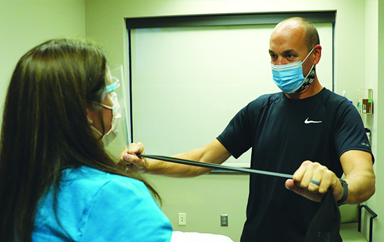 William Pettit doing physical therapy exercises