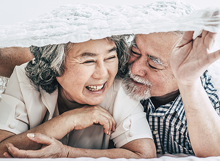 Older couple in a bed