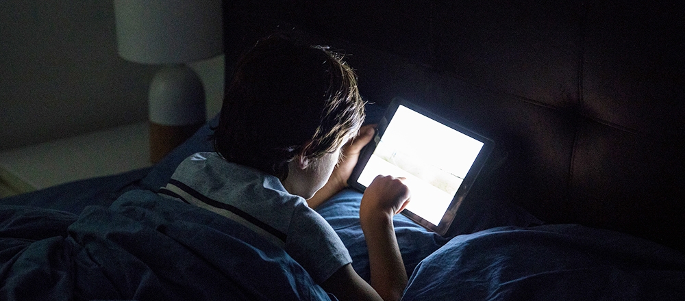 Less Screen Time is Key to Better Sleep in Kids